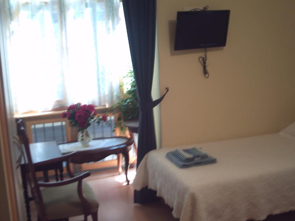 Postel nebo postele na pokoji v ubytování Pensión la Marinera