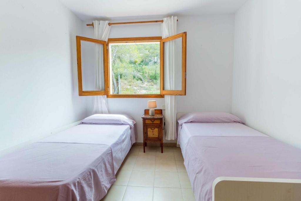 A bed or beds in a room at Casa Mar