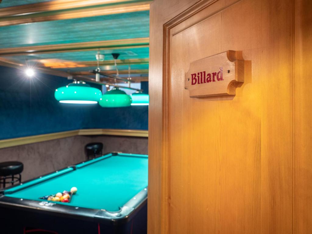 Biliár nebo kulečník v ubytování Hotel Gletscherblick Grindelwald