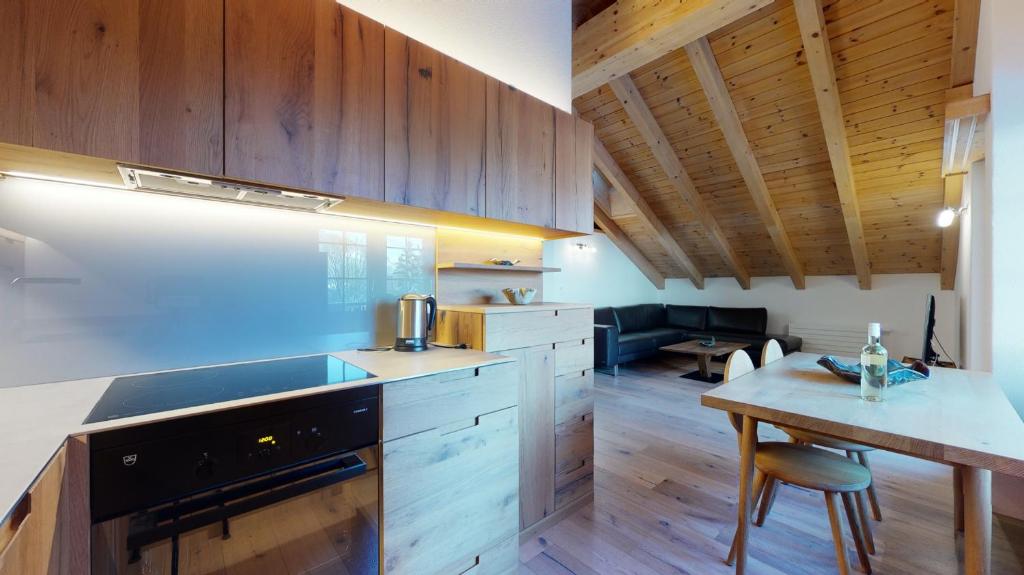 Kuchyň nebo kuchyňský kout v ubytování Haus Marietta - Leukerbad