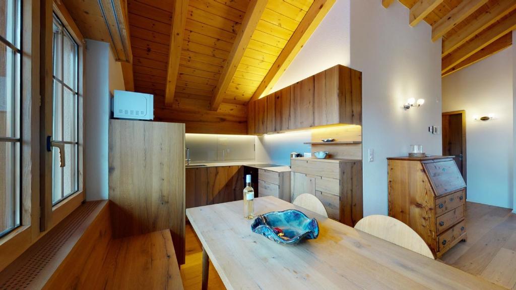 Kuchyň nebo kuchyňský kout v ubytování Haus Marietta - Leukerbad