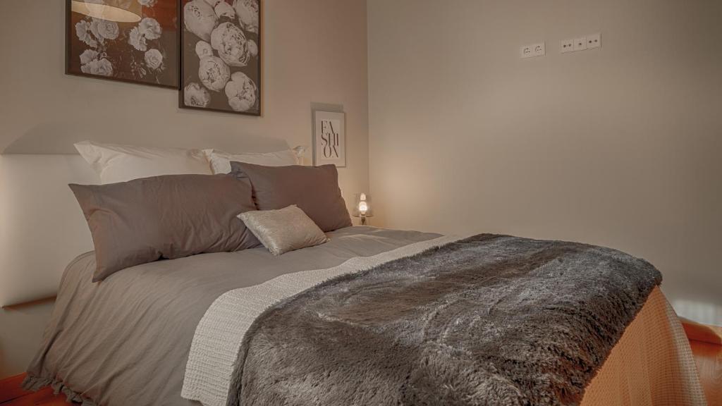 Postel nebo postele na pokoji v ubytování Saplan Real Estate SARRAERA