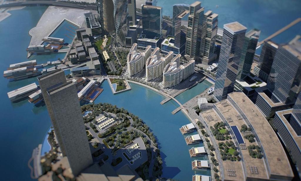 an overhead view of a city with tall buildings at Bahrain bay studio in Manama