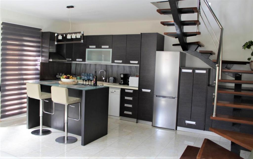 Kuchyň nebo kuchyňský kout v ubytování Casa Ariadne
