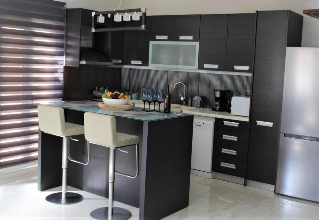 Kuchyň nebo kuchyňský kout v ubytování Casa Ariadne