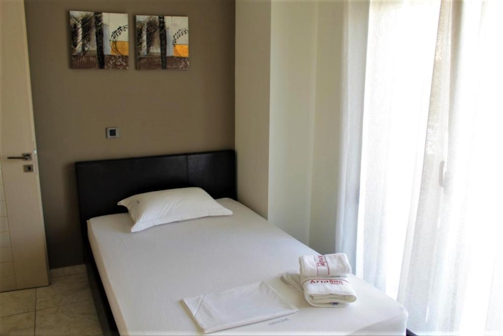 Postel nebo postele na pokoji v ubytování Casa Ariadne