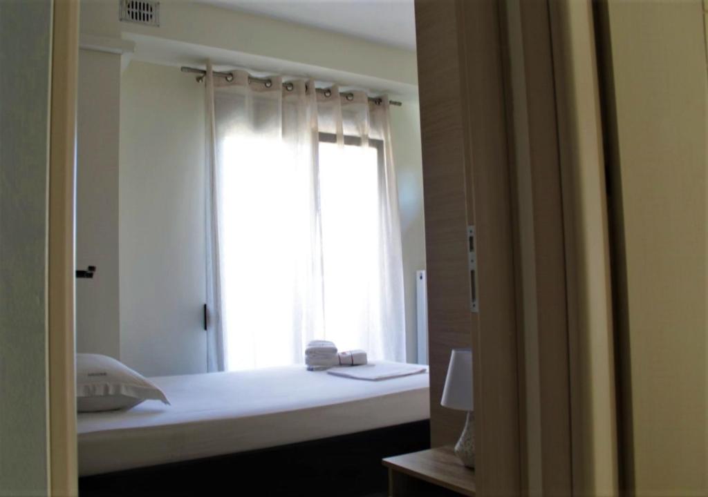 Postel nebo postele na pokoji v ubytování Casa Ariadne