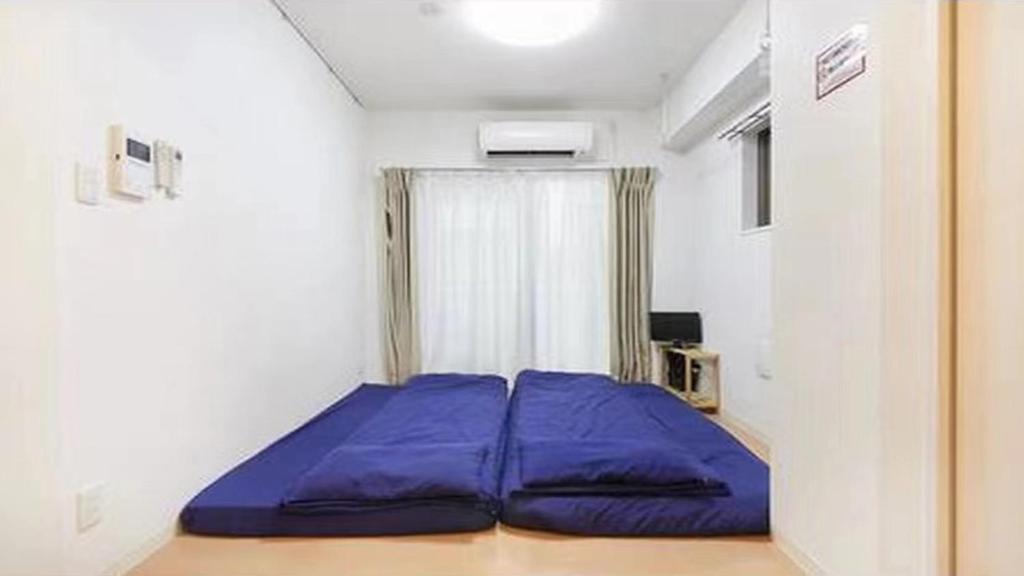 מיטה או מיטות בחדר ב-Marvelous Kinshicho - Vacation STAY 13097v