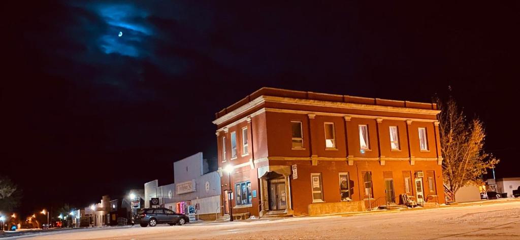 a building on the side of a street at night at The Westland Suite in Chester