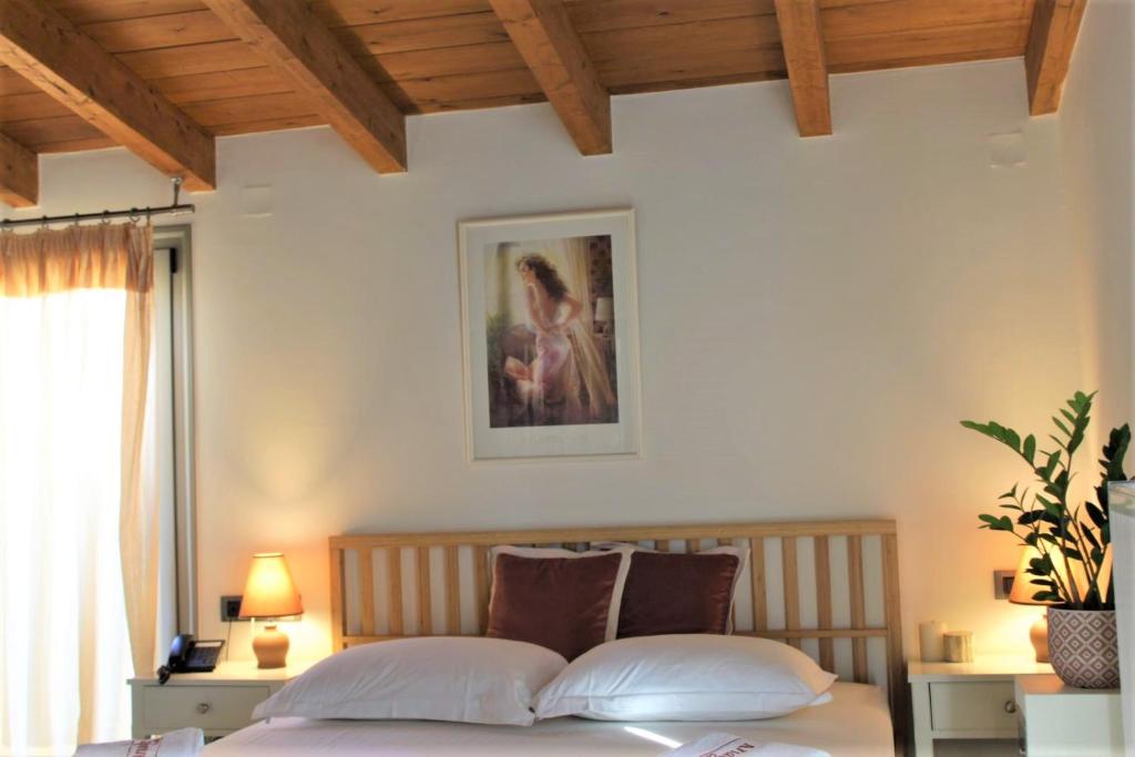 Postel nebo postele na pokoji v ubytování Casa Ariadne
