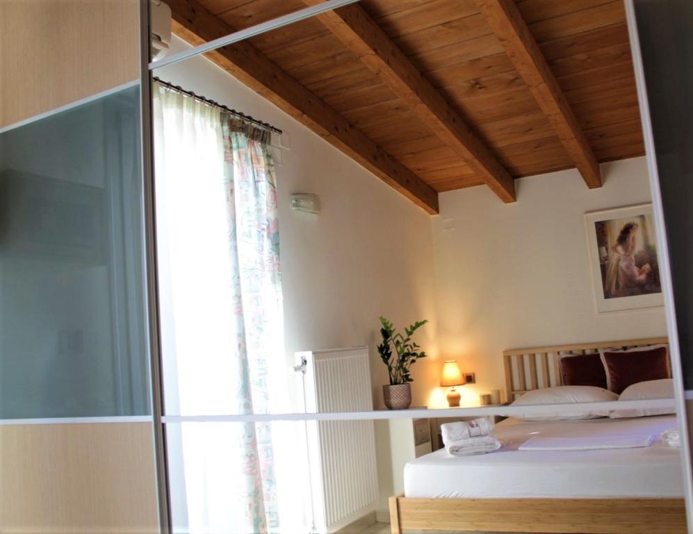 Postel nebo postele na pokoji v ubytování Casa Ariadne