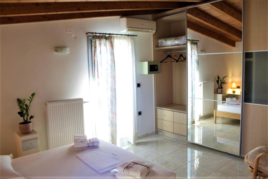 Postel nebo postele na pokoji v ubytování Casa Ariadne