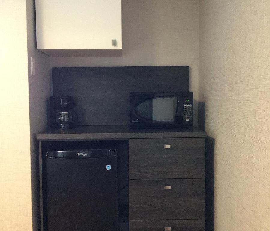 Kuchyň nebo kuchyňský kout v ubytování Hotel Classique