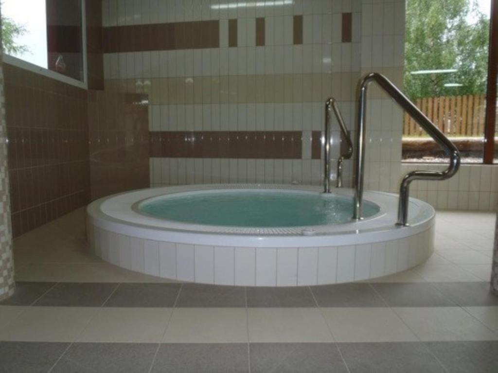 Fotografia z galérie ubytovania Szymoszkowa Residence Ski & basen sauny jacuzzi - apartament Szara Owca v destinácii Kościelisko