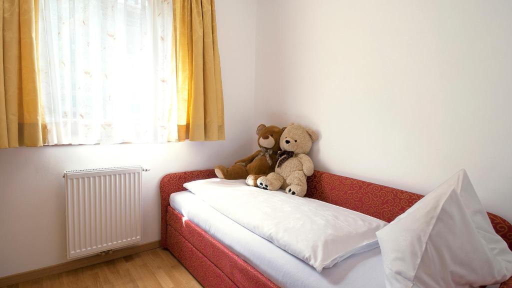 Posteľ alebo postele v izbe v ubytovaní Hotel Sonnenhof