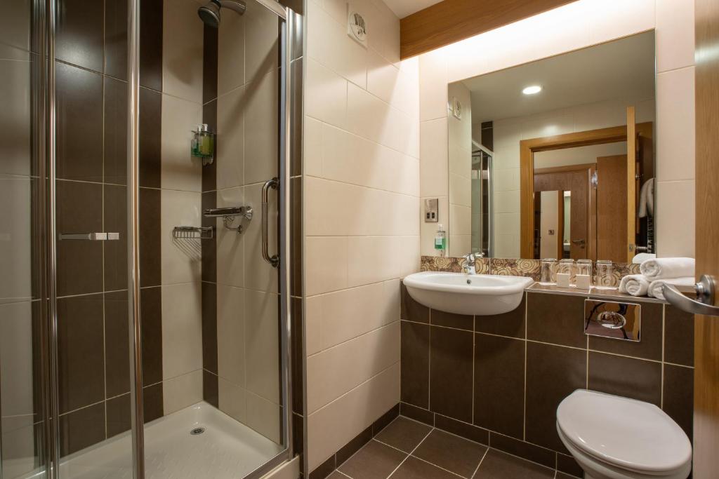 Koupelna v ubytování Belmore Court & Motel