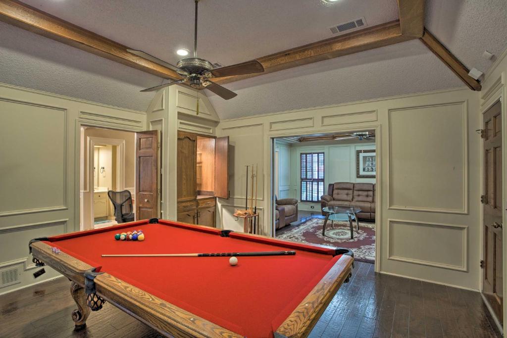 a pool table in a living room with a ceiling at Family-Friendly Home with Pool Table, Patio, and Grill in McKinney