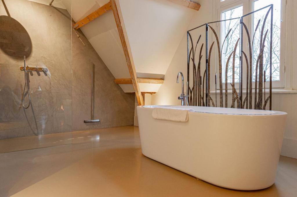 Bossche Suites Stationsweg - Resim 35