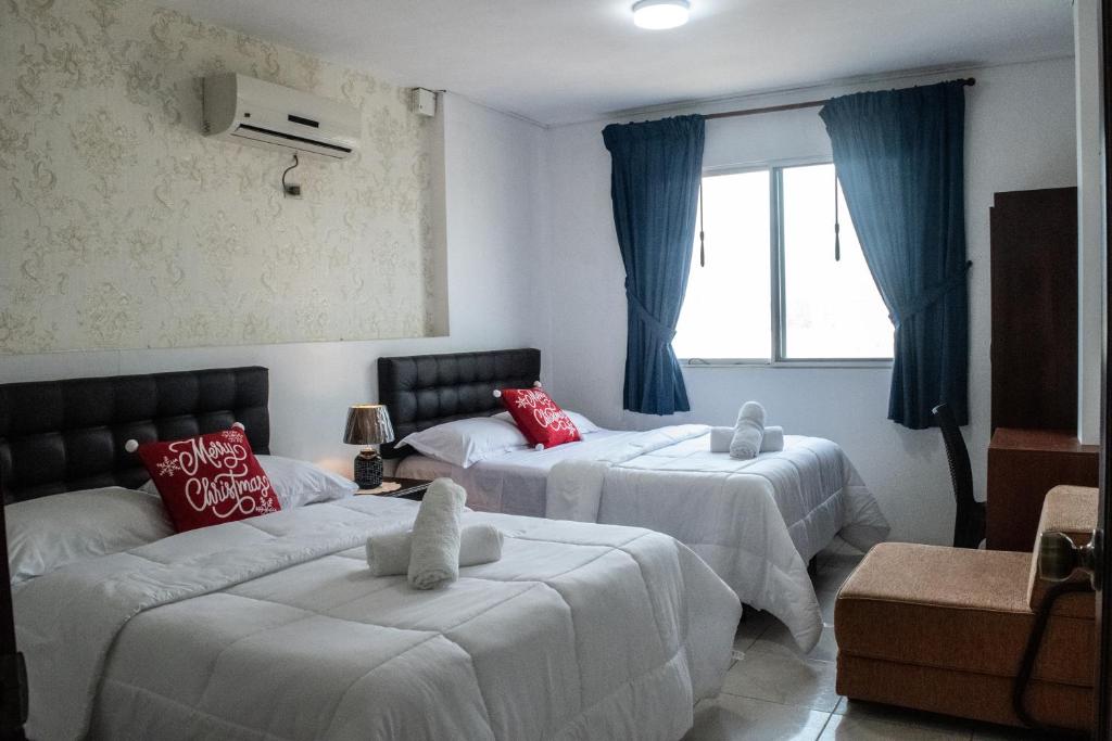 Postel nebo postele na pokoji v ubytování Hotel Valeritos