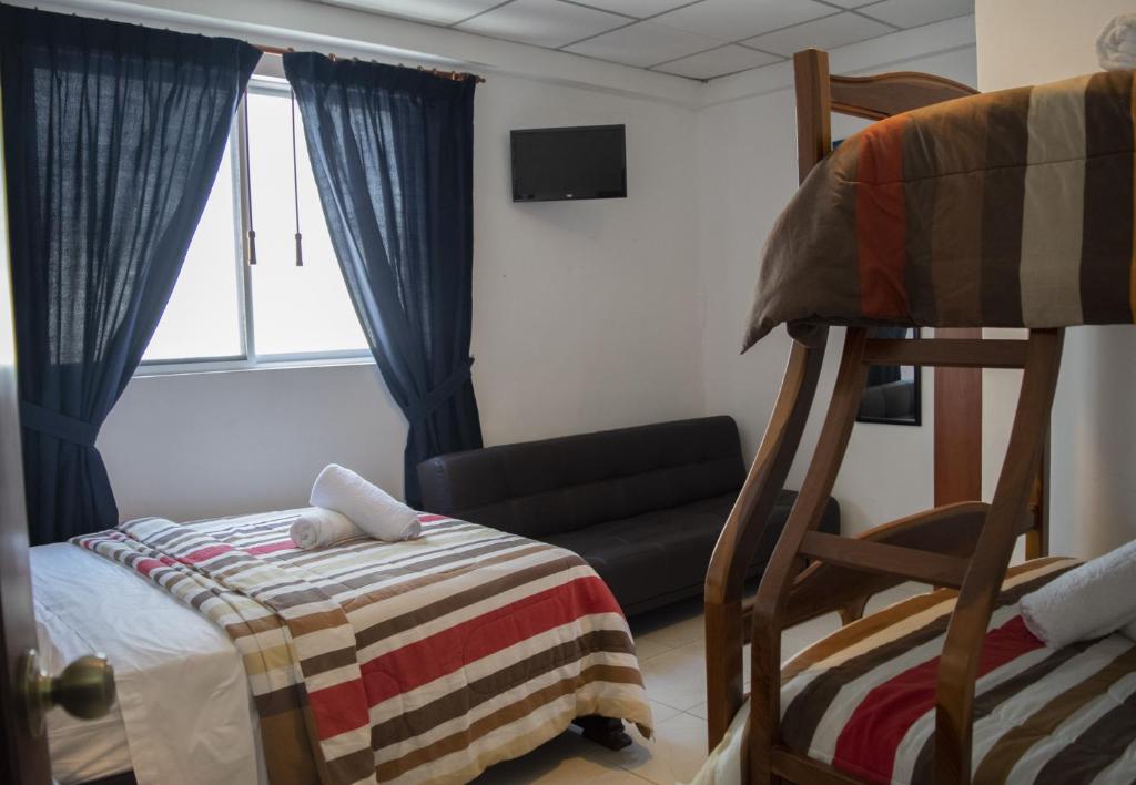 Postel nebo postele na pokoji v ubytování Hotel Valeritos