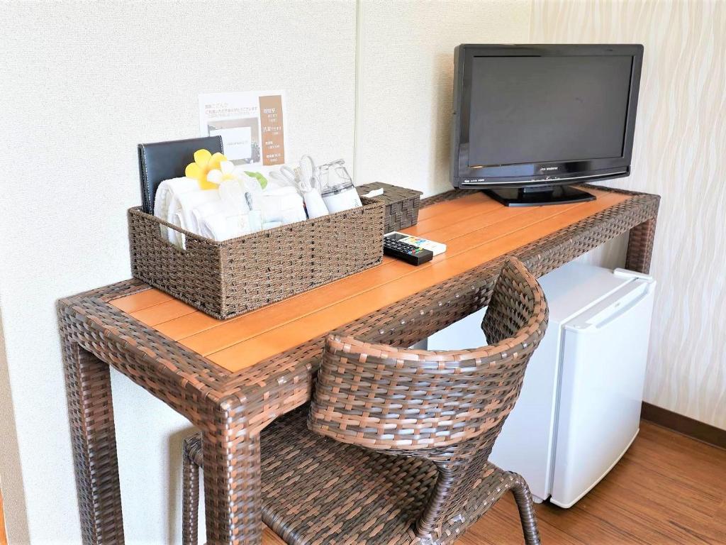 民宿さざんかにあるテレビまたはエンターテインメントセンター