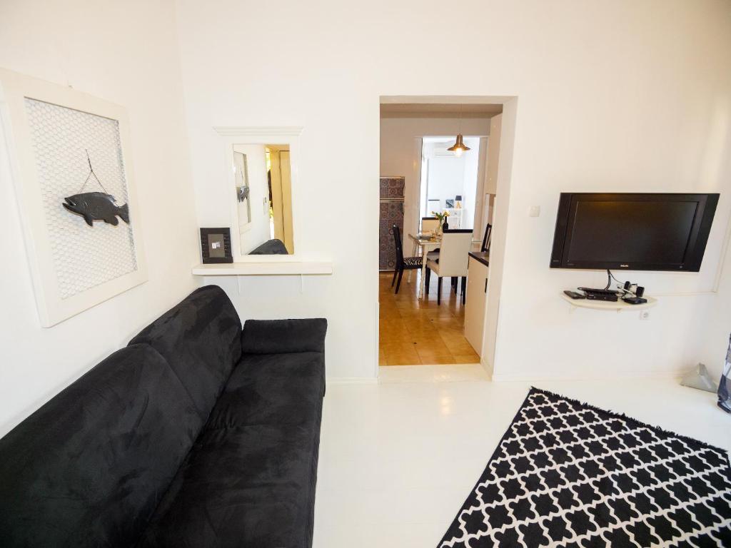 TV a/nebo společenská místnost v ubytování Apartment Eneja