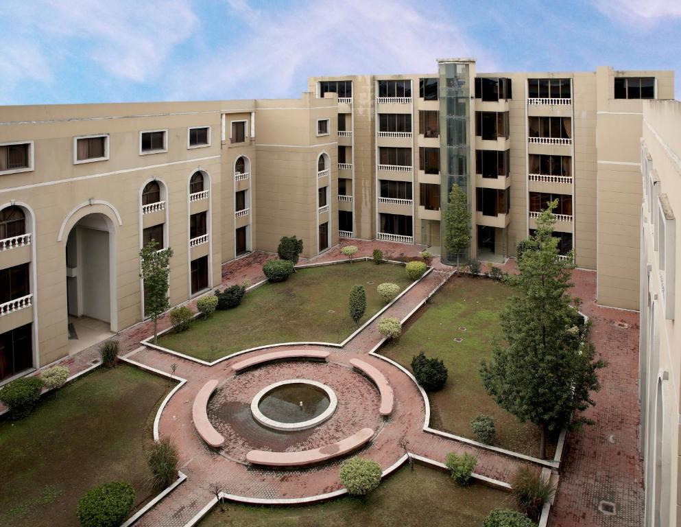 an aerial view of a courtyard in a building at Avari Xpress, Islamabad in Rawalpindi
