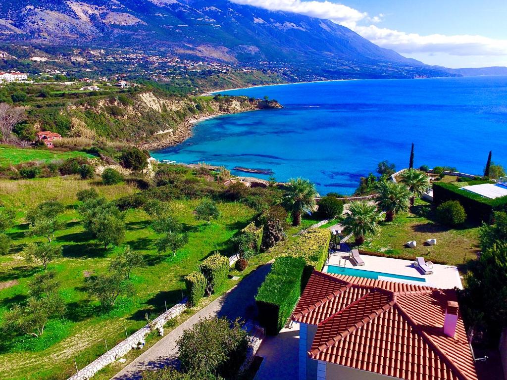 an aerial view of the ocean and a resort at Seaside Villa Kefaloniaprivatevillas in Argostoli