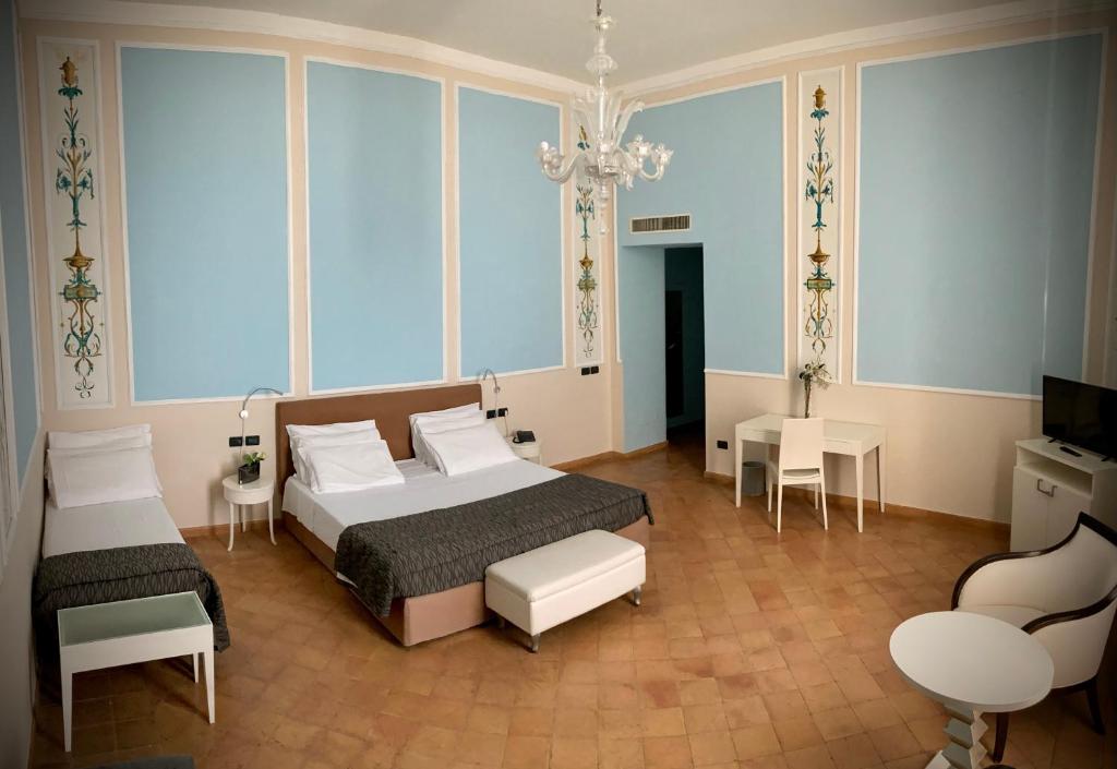 Postel nebo postele na pokoji v ubytování Miglio d'Oro Park Hotel