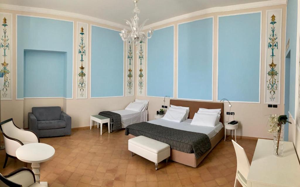 Postel nebo postele na pokoji v ubytování Miglio d'Oro Park Hotel