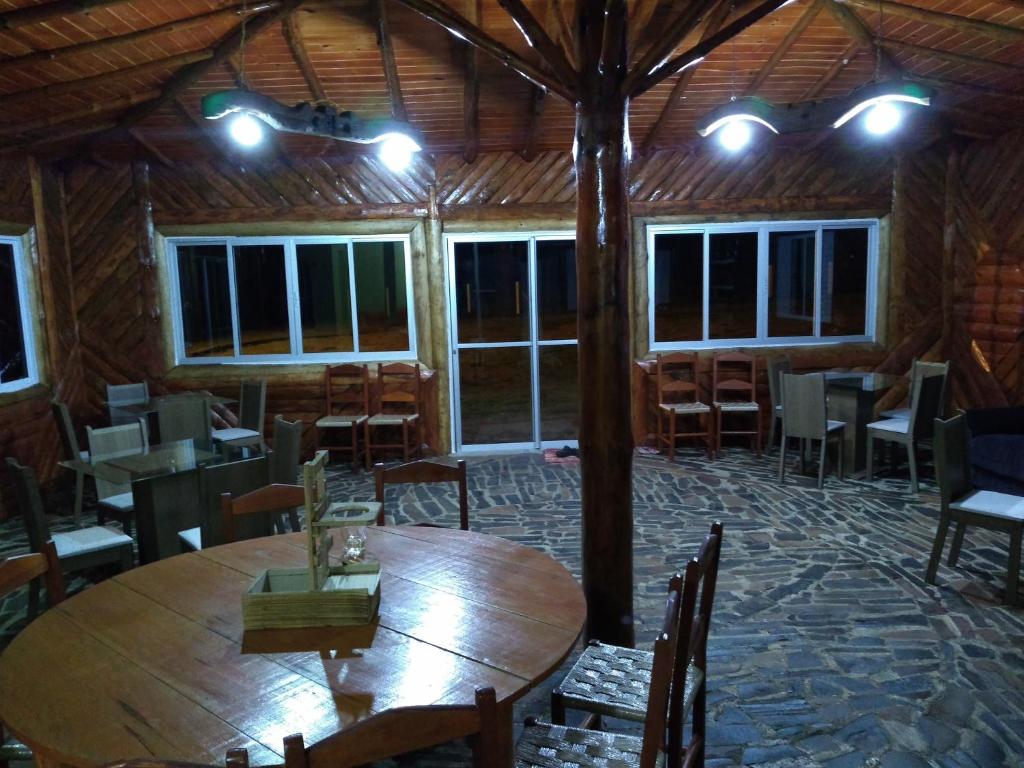 A restaurant or other place to eat at POUSADA FAZENDA PAIM