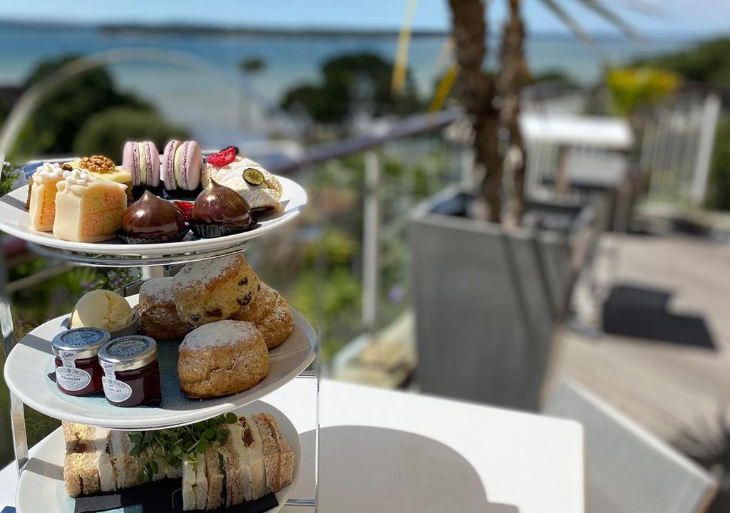 two plates of pastries on top of a table at Harbour Heights Hotel in Poole