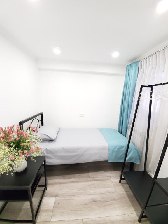 Postel nebo postele na pokoji v ubytování Central Guesthouse Gyumri