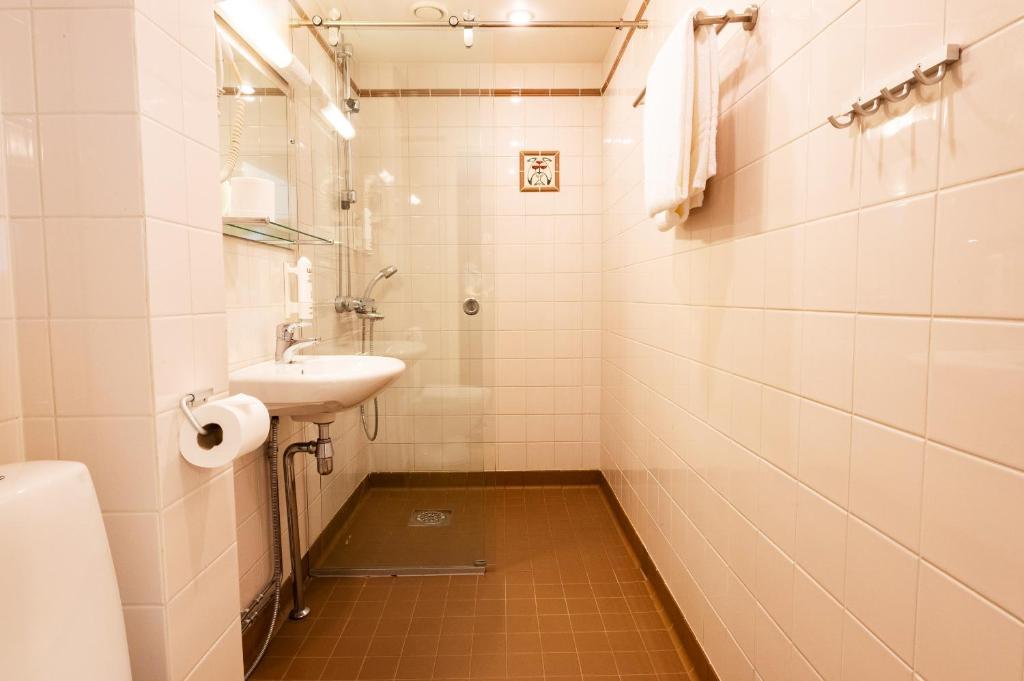 Koupelna v ubytování Hotel Arthur