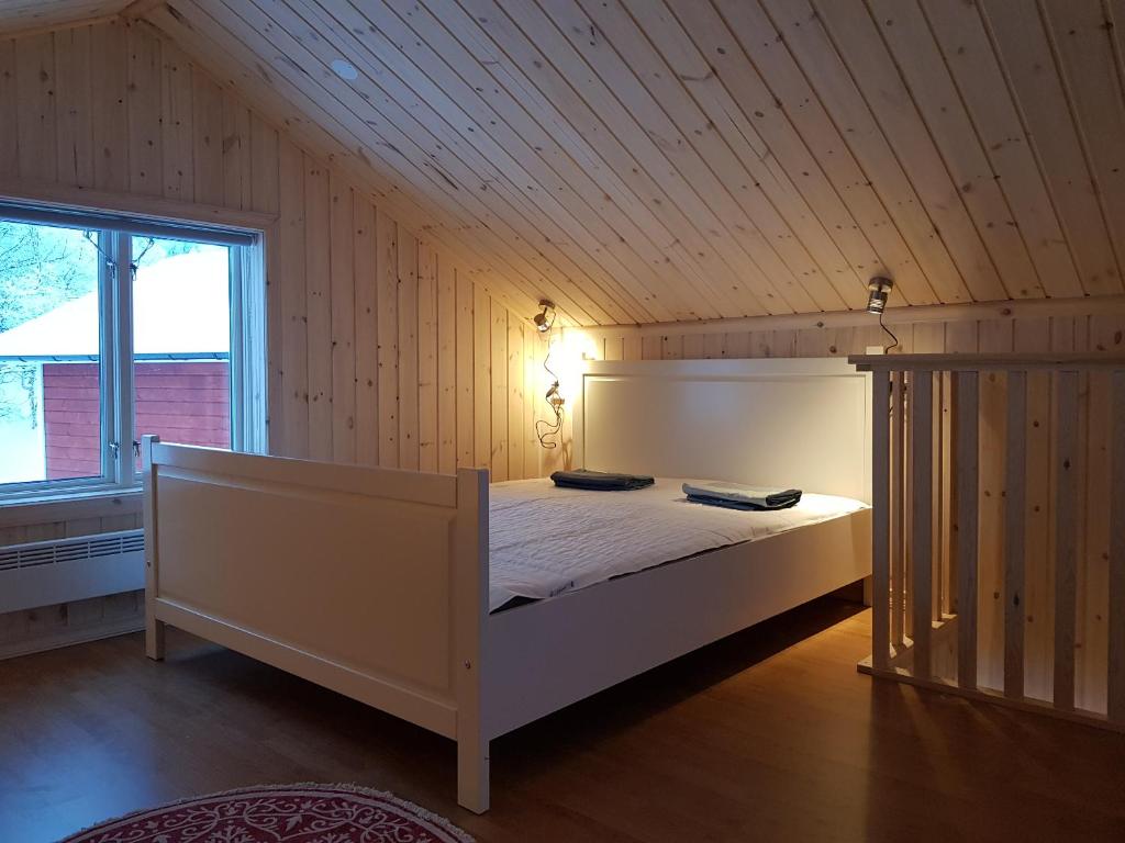 Кровать или кровати в номере Fjâllnäs Camping & Lodges
