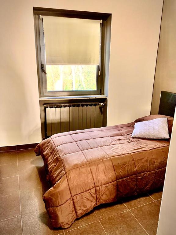 Postel nebo postele na pokoji v ubytování Hotel Ristorante Borgo Antico