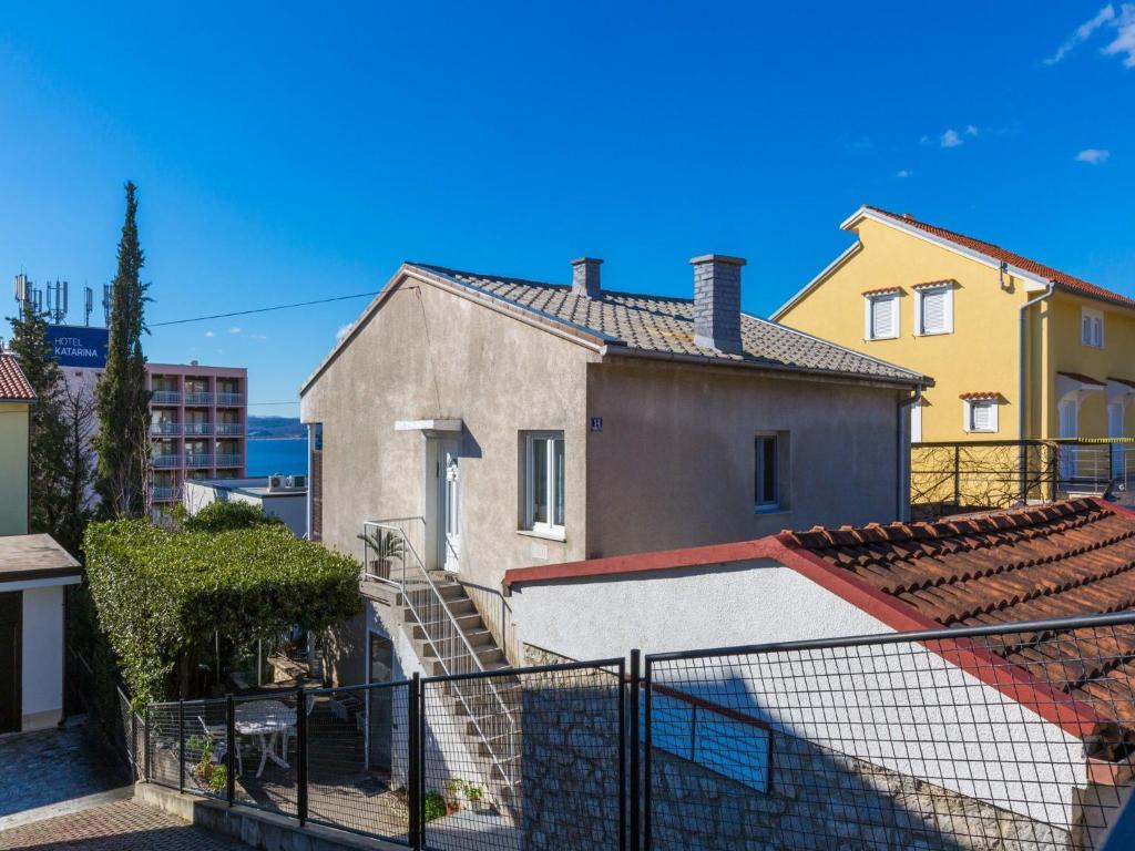 a view of a house from a balcony at Apartment KRUNO in Selce