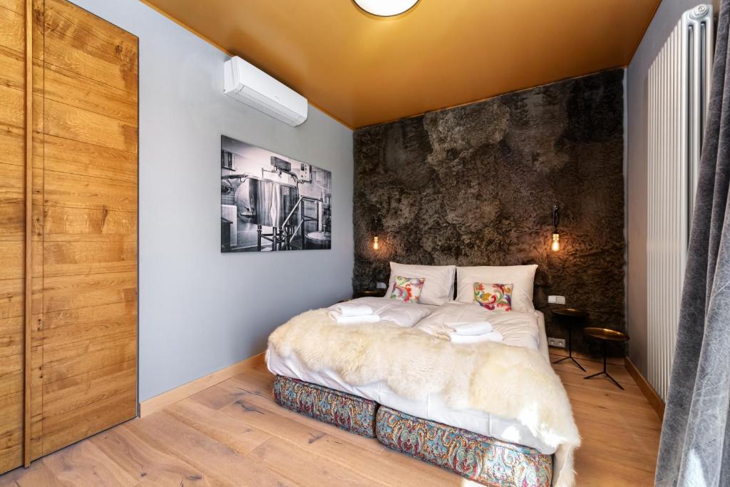 Postel nebo postele na pokoji v ubytování Oblík Resort