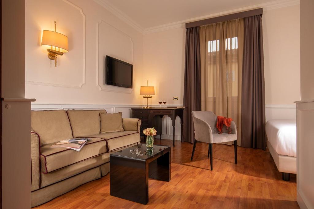 TV a/nebo společenská místnost v ubytování Hotel Del Corso