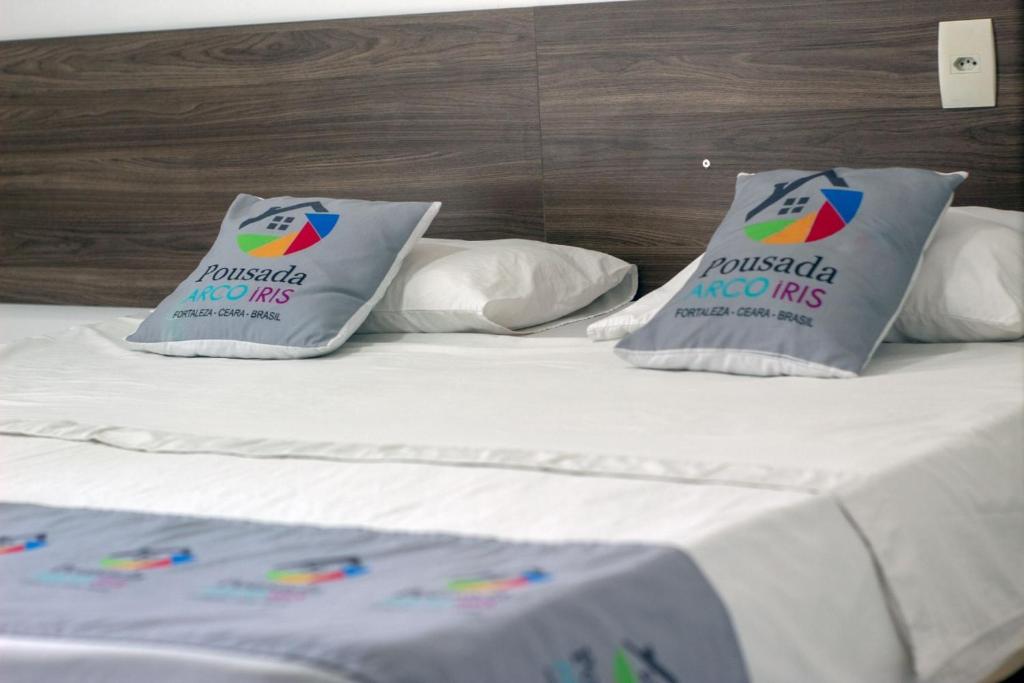 Postel nebo postele na pokoji v ubytování Pousada Arco Iris Fortaleza