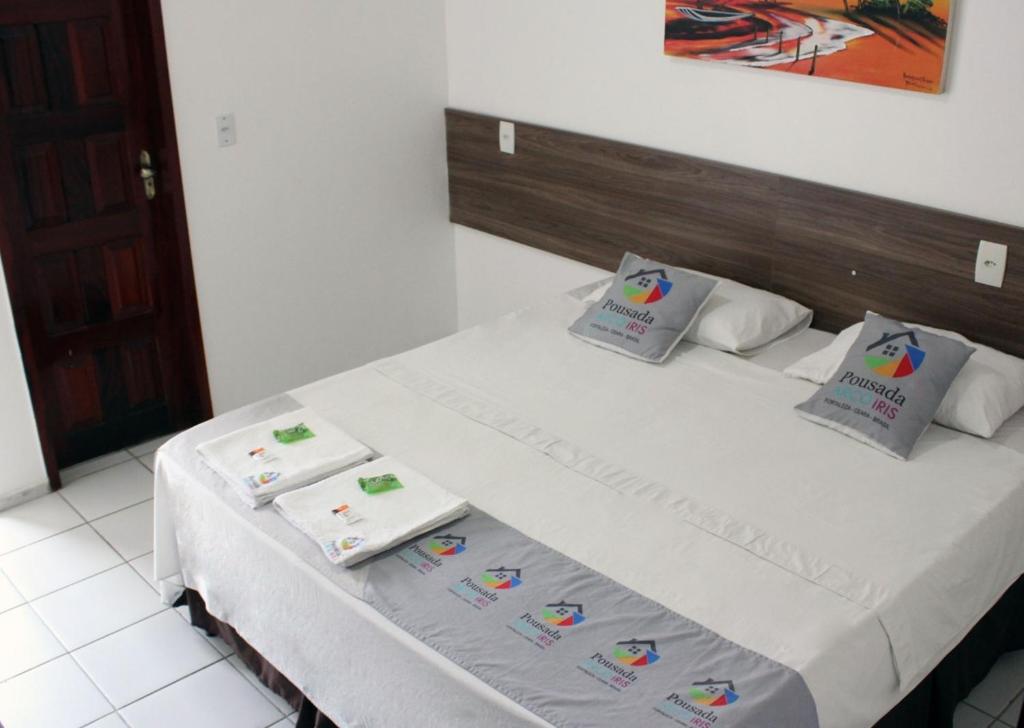 Postel nebo postele na pokoji v ubytování Pousada Arco Iris Fortaleza