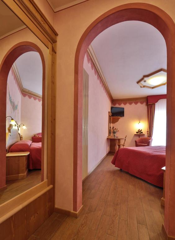 Łóżko lub łóżka w pokoju w obiekcie Hotel Fai