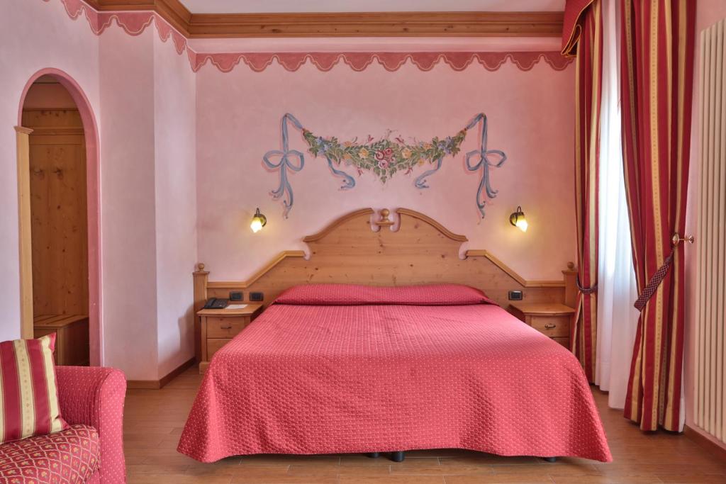 Łóżko lub łóżka w pokoju w obiekcie Hotel Fai