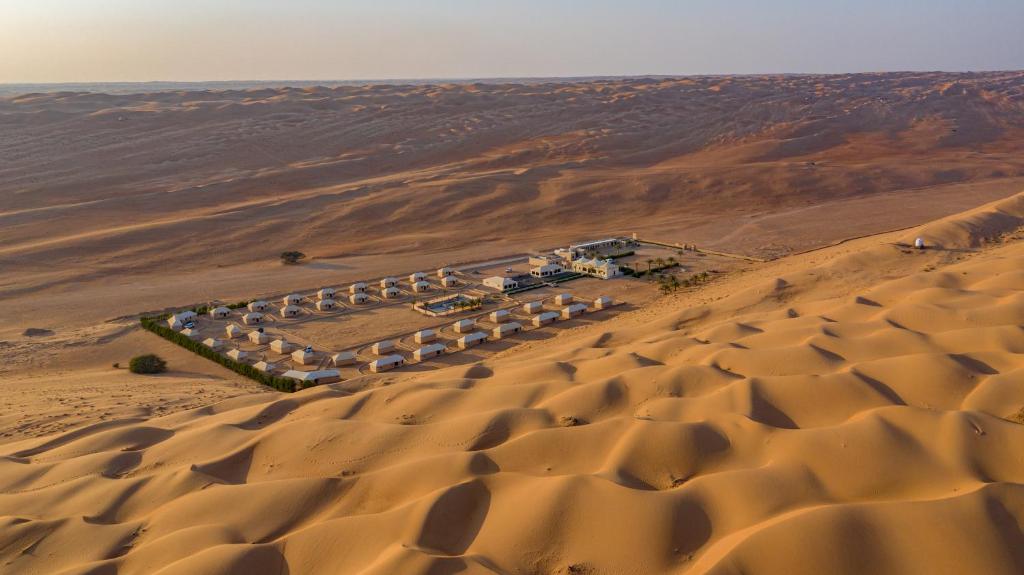 an aerial view of a compound in the desert at Desert Rose Camp in Badīyah