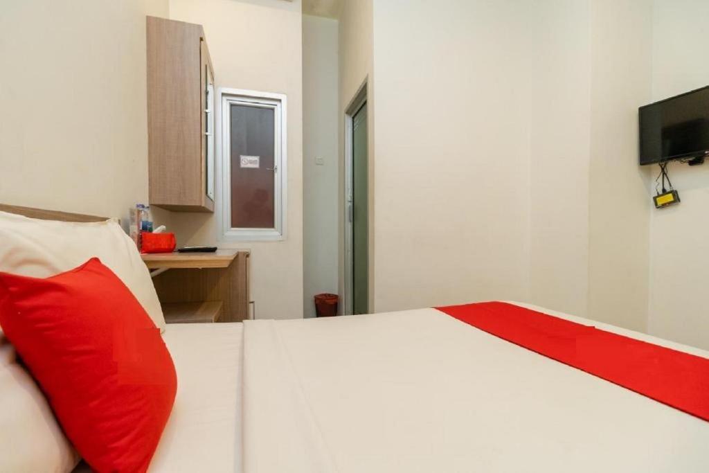 TV a/nebo společenská místnost v ubytování Hotel Domino