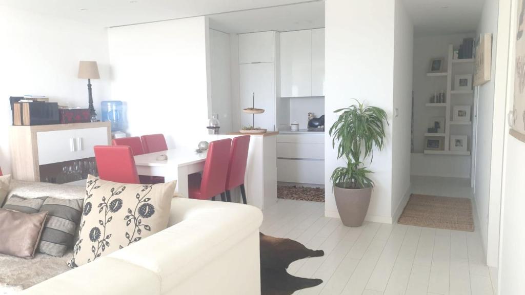 Svetainės erdvė apgyvendinimo įstaigoje 3 bedrooms appartement with sea view furnished terrace and wifi at Nigran