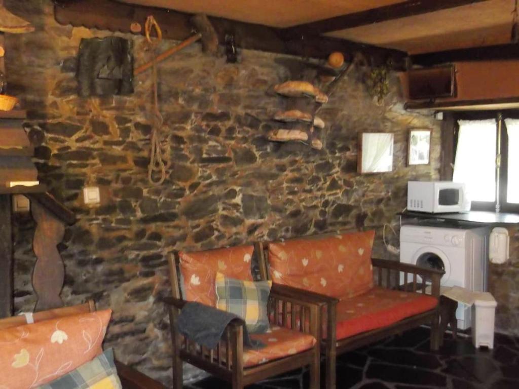 Posedenie v ubytovaní Spacious Apartment in Odollo, Mountain View, 150 sqm, Fireplace