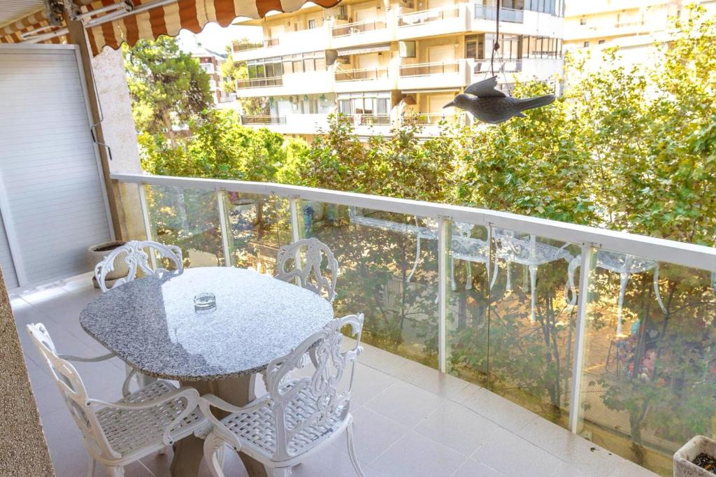 A balcony or terrace at Modern Apartment in Salou - 50 m² + Pool