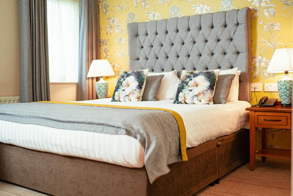Postel nebo postele na pokoji v ubytování The Wyatt Hotel