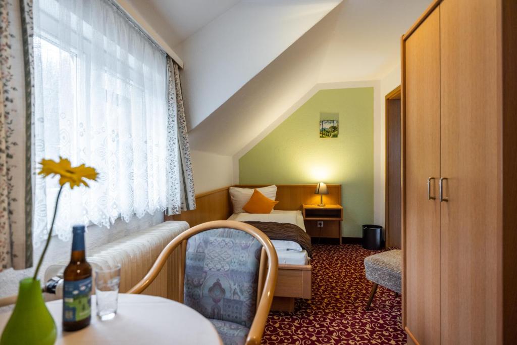 Postel nebo postele na pokoji v ubytování Pension & Café Abendröte